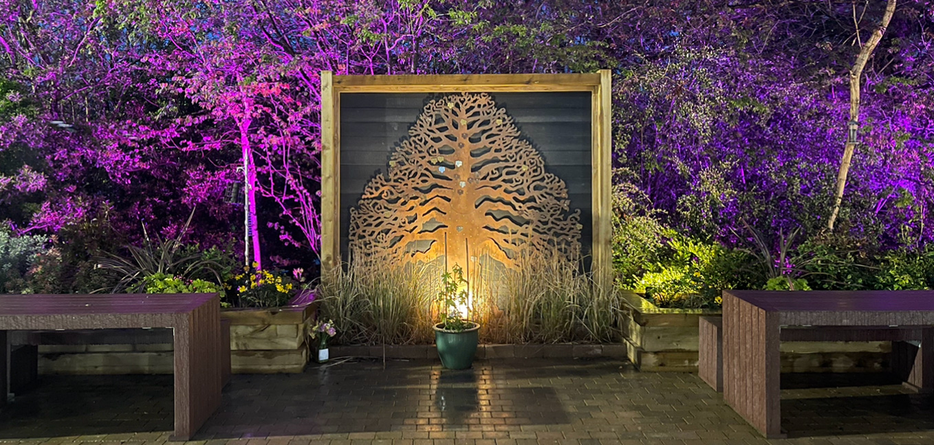 copper eternal tree installation with uplighting | made by Finch Tree UK