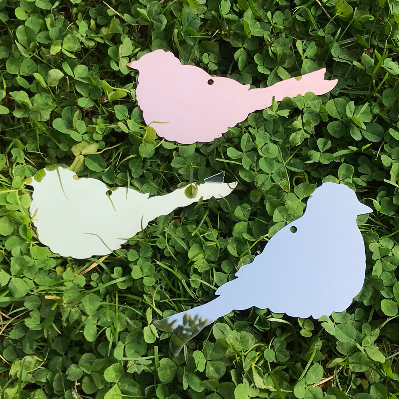 bird plaques in copper, brass & stainless steel