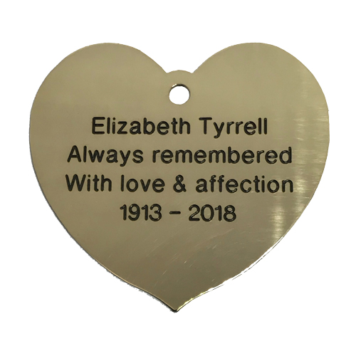 brass love heart plaques by Finch Tree