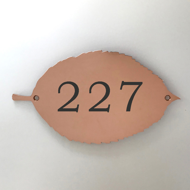Engraved copper apple leaf plaque by Metallic Garden