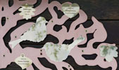 Brass leaf and Bird plaques installed on copper tree branch